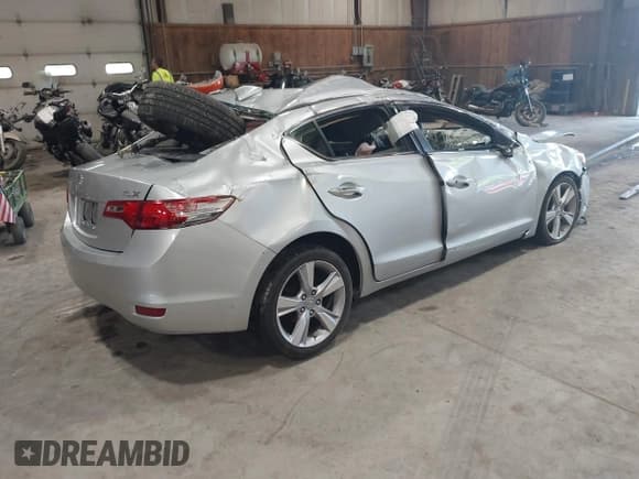 ✅ 2014 Acura ILX Technology • VIN: 19VDE1F75EE008423 • Lot: 42497766. Listed on IAAI with 95,113 mi. Free auction sales archive from the USA and detailed vehicle history report at DreamBid. Image 4.