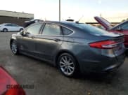 ✅ 2017 Ford Fusion Titanium • VIN: 3FA6P0SU4HR209717 • Lot: 92413655. Listed on Copart with 220,779 mi. Free auction sales archive from the USA and detailed vehicle history report at DreamBid. Image 2.