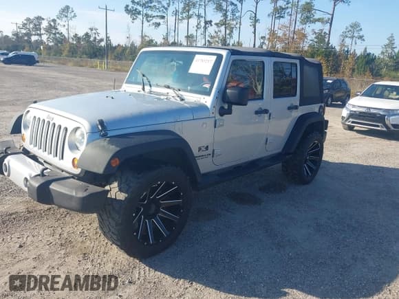 ✅ 2008 Jeep Wrangler Unlimited X • VIN: 1J4GA391X8L542610 • Lot: 43783217. Listed on IAAI with 203,955 mi. Free auction sales archive from the USA and detailed vehicle history report at DreamBid. Image 2.
