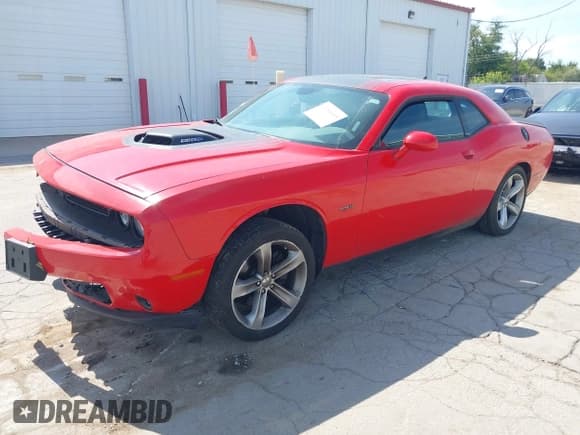 ✅ 2016 Dodge Challenger R/T Plus • VIN: 2C3CDZBT3GH299992 • Lot: 43188443. Listed on IAAI with 57,177 mi. Free auction sales archive from the USA and detailed vehicle history report at DreamBid. Image 17.