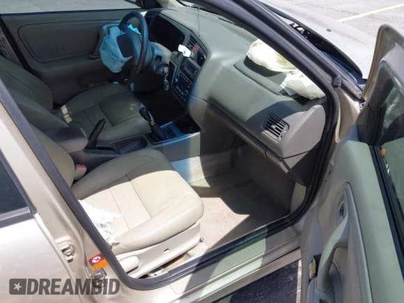 ✅ 1999 Infiniti G20 • VIN: JNKCP11A8XT013575 • Lot: 42512353. Wystawiony na IAAI z przebiegiem 291 026 mil. Bezpłatny archiwum sprzedaży aukcyjnych z USA i szczegółowy raport historii pojazdu na DreamBid. Zdjęcie 5.