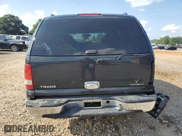 ✅ 2005 Chevrolet Tahoe LS • VIN: 1GNEC13V15J243156 • Lot: 65016435. Listed on Copart with 214,344 mi. Free auction sales archive from the USA and detailed vehicle history report at DreamBid. Image 6.