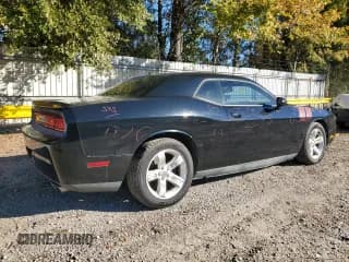 ✅ 2013 Dodge Challenger SXT • VIN: 2C3CDYAG3DH742023 • Lot: 84168954. Wystawiony na Copart z przebiegiem 284 756 mil. Bezpłatny archiwum sprzedaży aukcyjnych z USA i szczegółowy raport historii pojazdu na DreamBid. Zdjęcie 3.