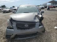 ✅ 2010 Kia Rio LX • VIN: KNADH4A36A6629770 • Lot: 56088614. Wystawiony na Copart z przebiegiem Nie podano. Bezpłatny archiwum sprzedaży aukcyjnych z USA i szczegółowy raport historii pojazdu na DreamBid. Zdjęcie 5.