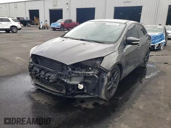 ✅ 2016 Ford Focus SE • VIN: 1FADP3F26GL301474 • Lot: 94105255. Listed on Copart with 133,149 mi. Free auction sales archive from the USA and detailed vehicle history report at DreamBid. Image 14.