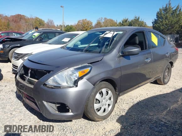 ✅ 2018 Nissan Versa SV • VIN: 3N1CN7AP1JL858958 • Lot: 43698876. Listed on IAAI with 119,827 mi. Free auction sales archive from the USA and detailed vehicle history report at DreamBid. Image 2.