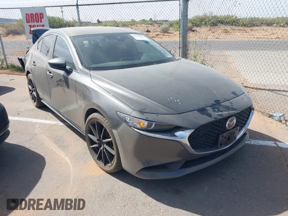 ✅ 2021 Mazda 3 Select • VIN: JM1BPABL7M1334057 • Lot: 42135292. Listed on IAAI with 51,598 mi. Free auction sales archive from the USA and detailed vehicle history report at DreamBid. Image 1.