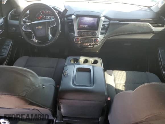 2018 Chevrolet Suburban LS с VIN 1GNSCGEC6JR300464, выставлен на аукционе Copart как лот 49809615 с пробегом 54 298 миль миль и Списание • Salvage title. История ставок и продаж доступна на DreamBid. Изображение 8.