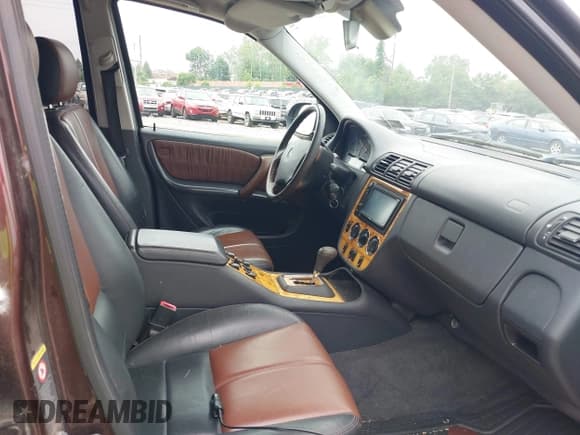 ✅ 2001 Mercedes-Benz M 320/430/500 • VIN: 4JGAB54EX1A243467 • Lot: 42467238. Listed on IAAI with 169,806 mi. Free auction sales archive from the USA and detailed vehicle history report at DreamBid. Image 5.