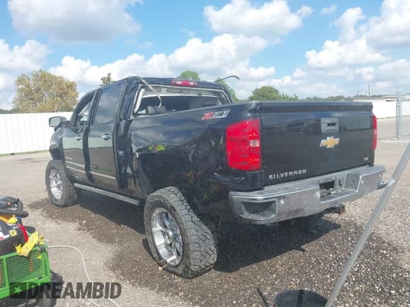 ✅ 2014 Chevrolet Silverado 1500 LTZ • VIN: 3GCUKSEC1EG106700 • Лот: 43538293. Опубликован ранее на IAAI с пробегом 184 520 миль. Бесплатный доступ к архиву аукционных продаж из США и подробный отчёт об истории автомобиля на DreamBid. Изображение 3.