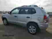 2009 Hyundai Tucson GLS with VIN KM8JM12B79U012399, listed as a Copart auction lot 77663414 with 164,615 mi miles and Salvage title. Bid and sale history available at DreamBid. Image 2.