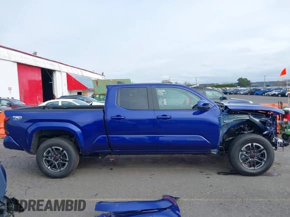 ✅ 2025 Toyota Tacoma SR • VIN: 3TMLB5JN2SM095448 • Лот: 41736119. Опубликован ранее на IAAI с пробегом 9 845 миль. Бесплатный доступ к архиву аукционных продаж из США и подробный отчёт об истории автомобиля на DreamBid. Изображение 14.