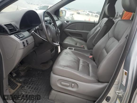 ✅ 2010 Honda Odyssey EX-L • VIN: 5FNRL3H79AB035026 • Lot: 45910525. Listed on Copart with 133,818 mi. Free auction sales archive from the USA and detailed vehicle history report at DreamBid. Image 7.