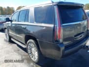 ✅ 2016 Cadillac Escalade Platinum • VIN: 1GYS4DKJ5GR119009 • Lot: 43718664. Listed on IAAI with 152,993 mi. Free auction sales archive from the USA and detailed vehicle history report at DreamBid. Image 3.