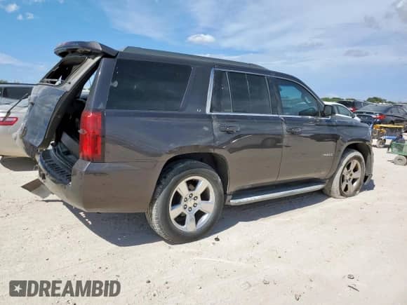 2015 Chevrolet Tahoe LT с VIN 1GNSCBKC2FR308446, выставлен на аукционе Copart как лот 69120375 с пробегом 169 986 миль миль и Списание • Salvage title. История ставок и продаж доступна на DreamBid. Изображение 3.