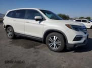 ✅ 2018 Honda Pilot EX-L • VIN: 5FNYF5H6XJB031766 • Лот: 64246195. Опубликован ранее на Copart с пробегом 82 173 миль. Бесплатный доступ к архиву аукционных продаж из США и подробный отчёт об истории автомобиля на DreamBid. Изображение 4.