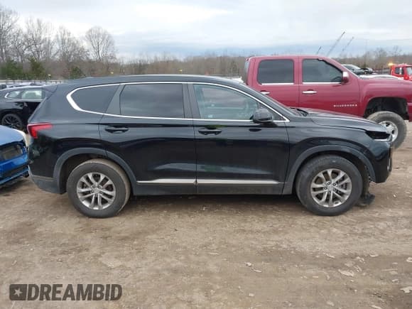 ✅ 2019 Hyundai Santa Fe SE • VIN: 5NMS23AD0KH100642 • Lot: 41456397. Listed on IAAI with 75,237 mi. Free auction sales archive from the USA and detailed vehicle history report at DreamBid. Image 13.