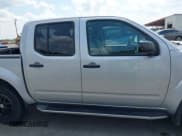 ✅ 2019 Nissan Frontier SV • VIN: 1N6AD0EV1KN761443 • Lot: 43256553. Listed on IAAI with 96,867 mi. Free auction sales archive from the USA and detailed vehicle history report at DreamBid. Image 14.