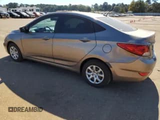 ✅ 2014 Hyundai Accent GLS • VIN: KMHCT4AE9EU671717 • Лот: 77382654. Опубликован ранее на Copart с пробегом 160 076 миль. Бесплатный доступ к архиву аукционных продаж из США и подробный отчёт об истории автомобиля на DreamBid. Изображение 2.