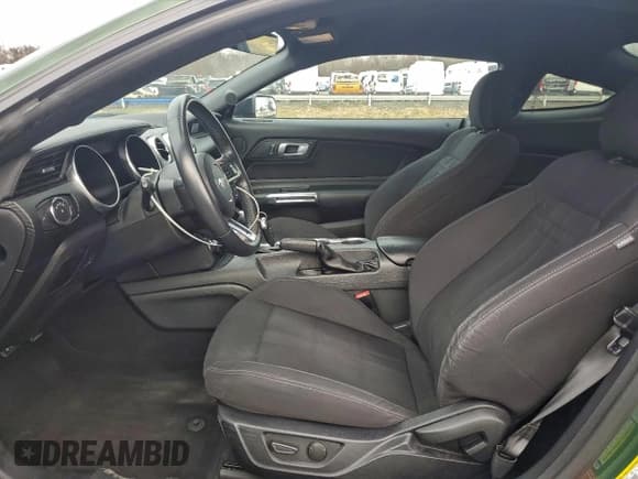 ✅ 2022 Ford Mustang EcoBoost • VIN: 1FA6P8TH8N5113409 • Lot: 94738565. Wystawiony na Copart z przebiegiem 38 805 mil. Bezpłatny archiwum sprzedaży aukcyjnych z USA i szczegółowy raport historii pojazdu na DreamBid. Zdjęcie 7.