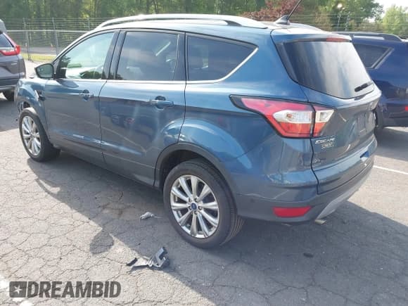 ✅ 2018 Ford Escape Titanium • VIN: 1FMCU9J92JUB01162 • Lot: 42495112. Listed on IAAI with 96,280 mi. Free auction sales archive from the USA and detailed vehicle history report at DreamBid. Image 3.