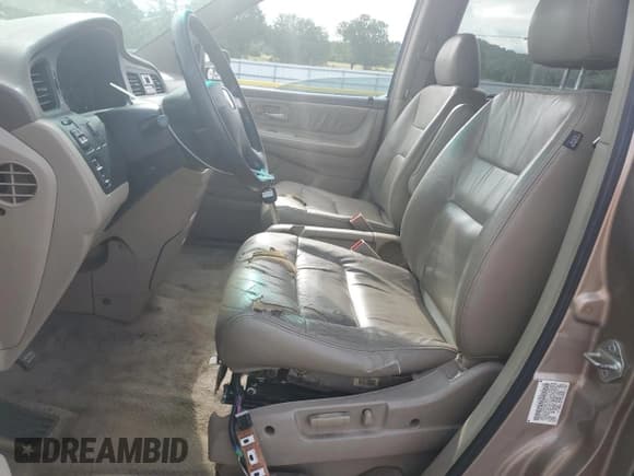 ✅ 2004 Honda Odyssey EX-L • VIN: 5FNRL18704B076024 • Lot: 67472935. Wystawiony na Copart z przebiegiem 231 112 mil. Bezpłatny archiwum sprzedaży aukcyjnych z USA i szczegółowy raport historii pojazdu na DreamBid. Zdjęcie 7.