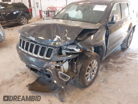 ✅ 2015 Jeep Grand Cherokee Limited • VIN: 1C4RJFBG0FC854611 • Lot: 42915098. Listed on IAAI with 144,057 mi. Free auction sales archive from the USA and detailed vehicle history report at DreamBid. Image 6.