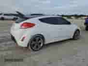 2012 Hyundai Veloster w/Red Int с VIN KMHTC6AD4CU076435, выставлен на аукционе Copart как лот 73015964 с пробегом 136 324 миль миль и Списание • Salvage title. История ставок и продаж доступна на DreamBid. Изображение 3.