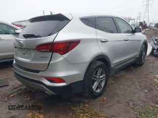 2017 Hyundai Santa Fe 2.4L z VIN 5XYZT3LB1HG437508, wystawiony jako IAAI lot #43278655 z przebiegiem 104 863 mil mil oraz . Historia ofert i sprzedaży dostępna na DreamBid. Obrazek 4.