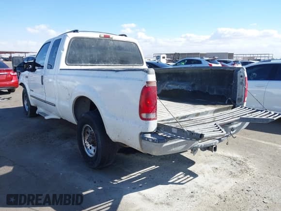 ✅ 1999 Ford F-250 XL • VIN: 1FTNX20F7XEE09160 • Lot: 41730434. Listed on IAAI with 261,564 mi. Free auction sales archive from the USA and detailed vehicle history report at DreamBid. Image 3.