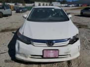 ✅ 2012 Honda Civic • VIN: JHMFB4F28CS011338 • Lot: 82193365. Listed on Copart with 79,642 mi. Free auction sales archive from the USA and detailed vehicle history report at DreamBid. Image 5.