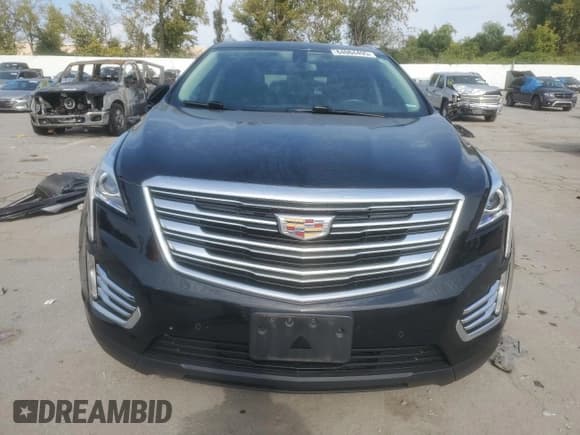 ✅ 2017 Cadillac XT5 Luxury AWD • VIN: 1GYKNDRS8HZ285523 • Lot: 84064495. Listed on Copart with 82,611 mi. Free auction sales archive from the USA and detailed vehicle history report at DreamBid. Image 5.