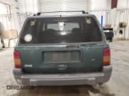 ✅ 1996 Jeep Grand Cherokee Laredo • VIN: 1J4GZ58S9TC198257 • Lot: 93327175. Listed on Copart with 169,183 mi. Free auction sales archive from the USA and detailed vehicle history report at DreamBid. Image 6.