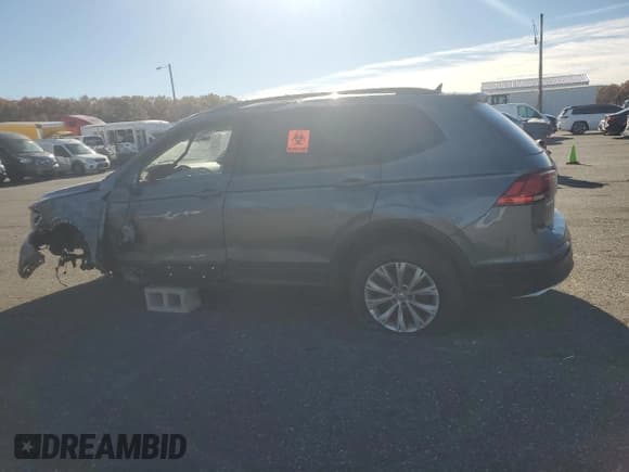 ✅ 2020 Volkswagen Tiguan S • VIN: 3VV0B7AX9LM144292 • Lot: 90301325. Listed on Copart with 99,999 mi. Free auction sales archive from the USA and detailed vehicle history report at DreamBid. Image 2.