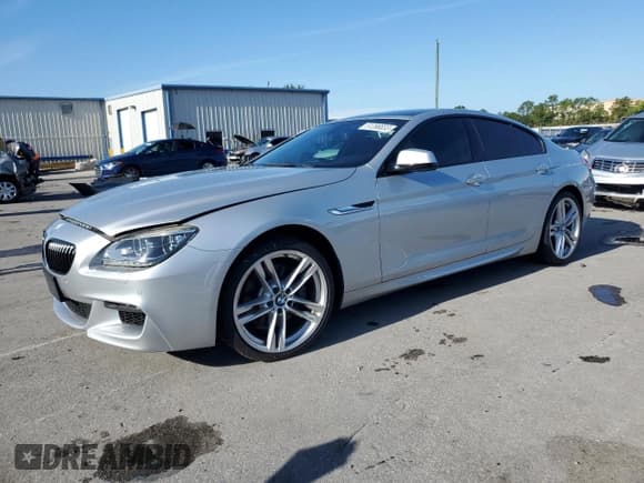 ✅ 2015 BMW 6 Series 640i • VIN: WBA6A0C57FD318985 • Lot: 61266833. Listed on Copart with 59,205 mi. Free auction sales archive from the USA and detailed vehicle history report at DreamBid. Image 1.