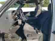 2002 Chevrolet Silverado 1500 LS with VIN 1GCEC14V72Z341127, listed as a Copart auction lot 56264674 with 306,494 mi miles and Salvage title. Bid and sale history available at DreamBid. Image 7.