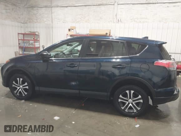 ✅ 2018 Toyota RAV4 LE • VIN: 2T3BFREV6JW767297 • Lot: 43736278. Listed on IAAI with 99,323 mi. Free auction sales archive from the USA and detailed vehicle history report at DreamBid. Image 15.