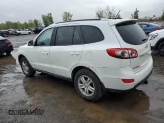 ✅ 2012 Hyundai Santa Fe GLS • VIN: 5XYZGDAG3CG166338 • Lot: 73139004. Listed on Copart with 124,377 mi. Free auction sales archive from the USA and detailed vehicle history report at DreamBid. Image 2.