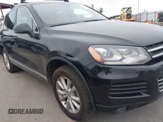 ✅ 2014 Volkswagen Touareg Exec • VIN: WVGEP9BP8ED010092 • Лот: 43552867. Опубликован ранее на IAAI с пробегом 195 008 миль. Бесплатный доступ к архиву аукционных продаж из США и подробный отчёт об истории автомобиля на DreamBid. Изображение 6.