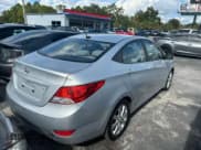 ✅ 2014 Hyundai Accent GLS • VIN: KMHCU4AE2EU614434 • Lot: 92322715. Listed on Copart with 157,392 mi. Free auction sales archive from the USA and detailed vehicle history report at DreamBid. Image 4.