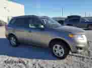 2012 Hyundai Santa Fe GLS с VIN 5XYZGDABXCG160265, выставлен на аукционе Copart как лот 70721424 с пробегом 115 181 миль миль и Списание • Salvage title. История ставок и продаж доступна на DreamBid. Изображение 4.