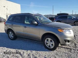 ✅ 2012 Hyundai Santa Fe GLS • VIN: 5XYZGDABXCG160265 • Lot: 70721424. Listed on Copart with 115,181 mi. Free auction sales archive from the USA and detailed vehicle history report at DreamBid. Image 4.