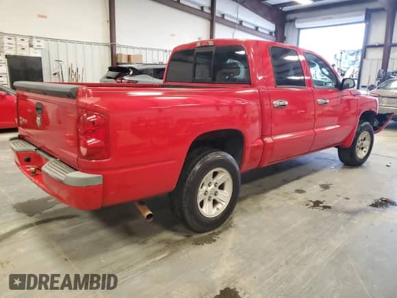 2008 Dodge Dakota SLT z VIN 1D7HE48K38S581338, wystawiony jako Copart lot #85081194 z przebiegiem 217 780 mil mil oraz Szkoda całkowita • Salvage title. Historia ofert i sprzedaży dostępna na DreamBid. Obrazek 3.