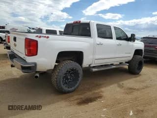 ✅ 2018 Chevrolet Silverado 1500 LTZ • VIN: 3GCUKSEC9JG467506 • Лот: 61156384. Опубликован ранее на Copart с пробегом 99 574 миль. Бесплатный доступ к архиву аукционных продаж из США и подробный отчёт об истории автомобиля на DreamBid. Изображение 3.