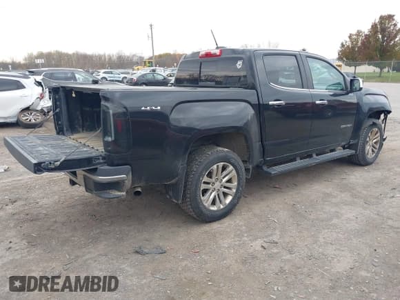 ✅ 2016 GMC Canyon 4WD SLT • VIN: 1GTG6DE3XG1293756 • Лот: 43620419. Опубликован ранее на IAAI с пробегом 185 595 миль. Бесплатный доступ к архиву аукционных продаж из США и подробный отчёт об истории автомобиля на DreamBid. Изображение 4.