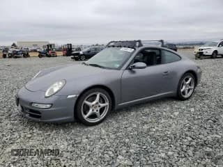 ✅ 2005 Porsche 911 Carrera 997 • VIN: WP0AA299X5S716754 • Lot: 61865175. Wystawiony na Copart z przebiegiem 71 156 mil. Bezpłatny archiwum sprzedaży aukcyjnych z USA i szczegółowy raport historii pojazdu na DreamBid. Zdjęcie 1.