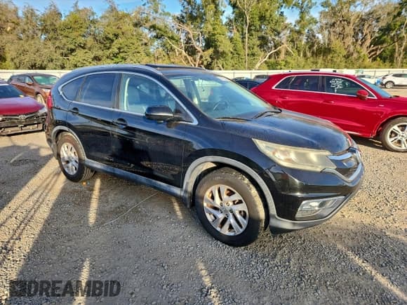 ✅ 2015 Honda CR-V EX-L • VIN: 2HKRM3H7XFH547187 • Lot: 94720455. Listed on Copart with 194,133 mi. Free auction sales archive from the USA and detailed vehicle history report at DreamBid. Image 4.