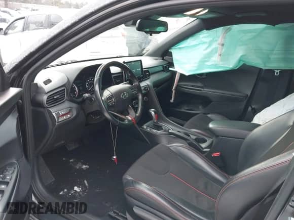 2019 Hyundai Veloster Premium z VIN KMHTG6AF7KU010854, wystawiony jako IAAI lot #41386268 z przebiegiem 87 133 mil mil oraz . Historia ofert i sprzedaży dostępna na DreamBid. Obrazek 5.