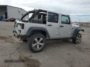 ✅ 2008 Jeep Wrangler Unlimited Rubicon • VIN: 1J8GA69188L586055 • Lot: 80672785. Listed on Copart with 242,392 mi. Free auction sales archive from the USA and detailed vehicle history report at DreamBid. Image 3.