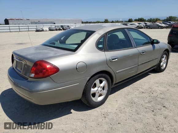 ✅ 2001 Ford Taurus LX • VIN: 1FAFP52U41G158715 • Lot: 68493825. Listed on Copart with 86,528 mi. Free auction sales archive from the USA and detailed vehicle history report at DreamBid. Image 3.